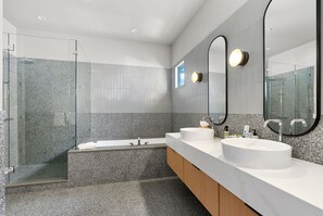 Shower, hair dryer, towels, shampoo