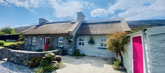 Thatch Cottage in Galway Bay nestled on the Burren along the Wild Atlantic Way