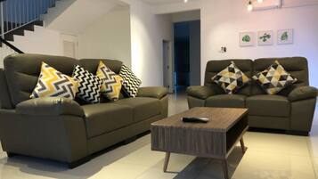 Deluxe Villa | Living area | 50-inch Smart TV with digital channels, Netflix, streaming services