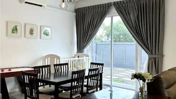 Deluxe Villa | Living area | 50-inch Smart TV with digital channels, Netflix, streaming services