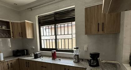 Spacious 4-Bedroom Oasis with Rooftop View - Near Kigali Airport & City Center
