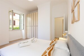 2 habitaciones, tabla de planchar con plancha, internet y ropa de cama 