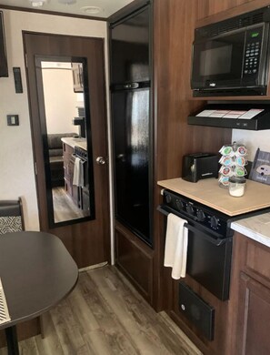 Fridge, microwave, coffee/tea maker, toaster