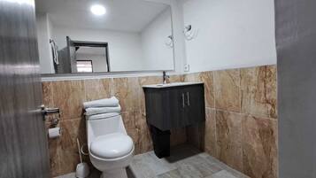 Jetted tub, towels, soap, toilet paper