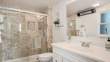 Hair dryer, towels, soap, shampoo