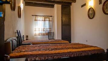 3 slaapkamers, een strijkplank/strijkijzer, wifi, beddengoed