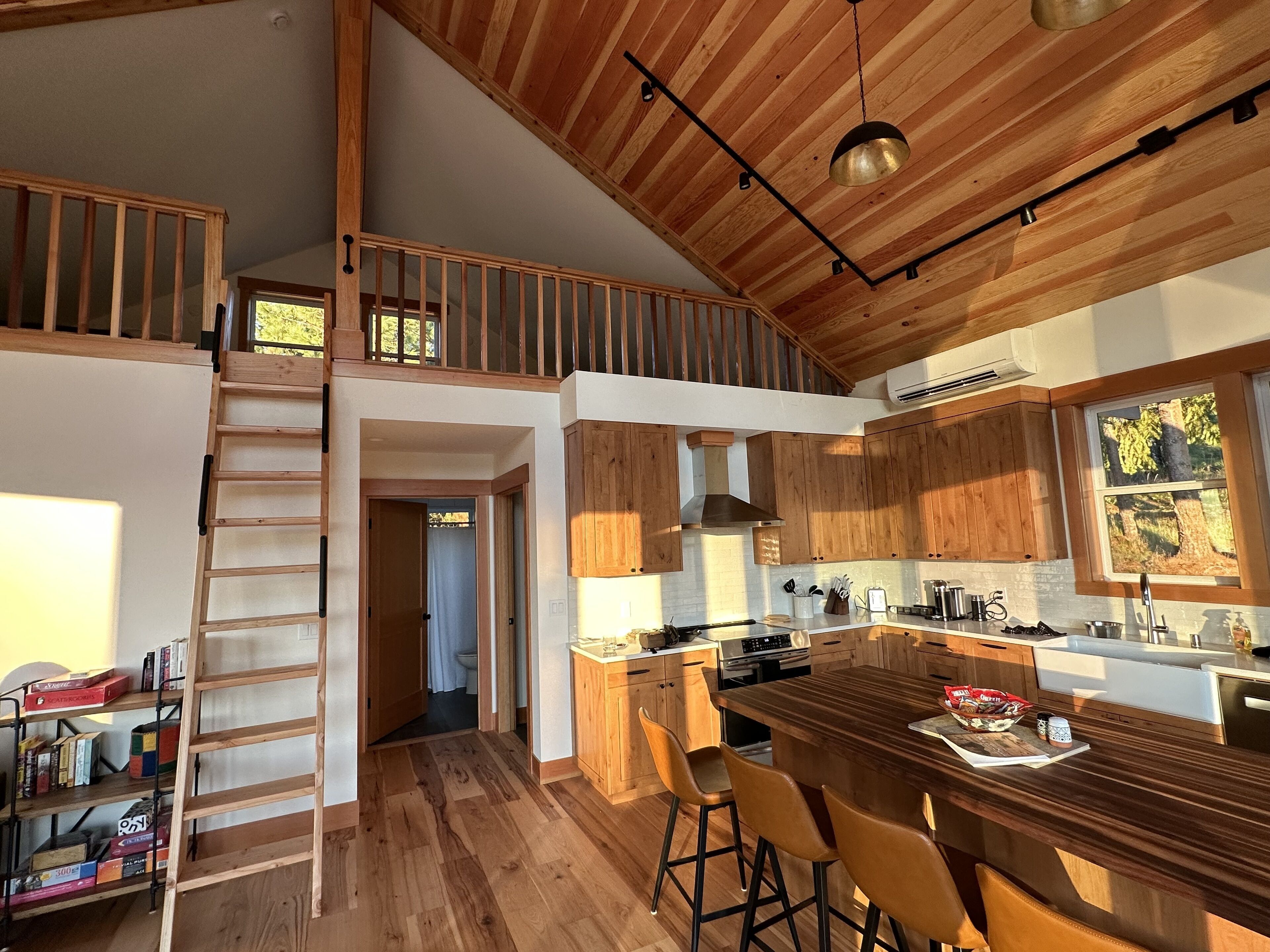 Kitchen and ladder stair to loft bedroom