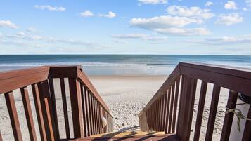 On the beach, sun loungers, beach towels