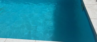 A bedroom and a bathroom