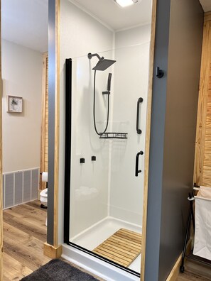 Shower, hair dryer, towels, soap