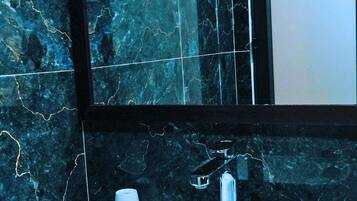 Shower, rainfall showerhead, designer toiletries, hair dryer