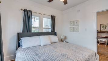 1 bedroom, desk, iron/ironing board, travel crib