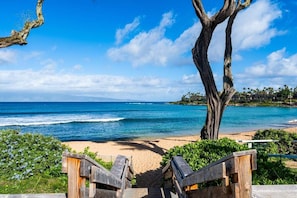 On the beach, sun loungers, beach towels