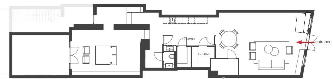 Plano de planta de un hotel que incluye una sauna, ducha y comedor.