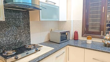 Fridge, microwave, dining tables