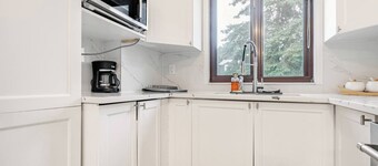 Spacious Home with Private Parking, Close to the Mall, Airport and Highways.