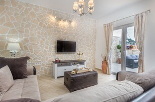 Luxury Apartment With Swimming Pool | Living area | 110-cm Smart TV with satellite channels, streaming services