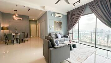 Comfort Apartment, 3 Bedrooms, Non Smoking, City View | Living area | 50-inch Smart TV with cable channels, Netflix, streaming services