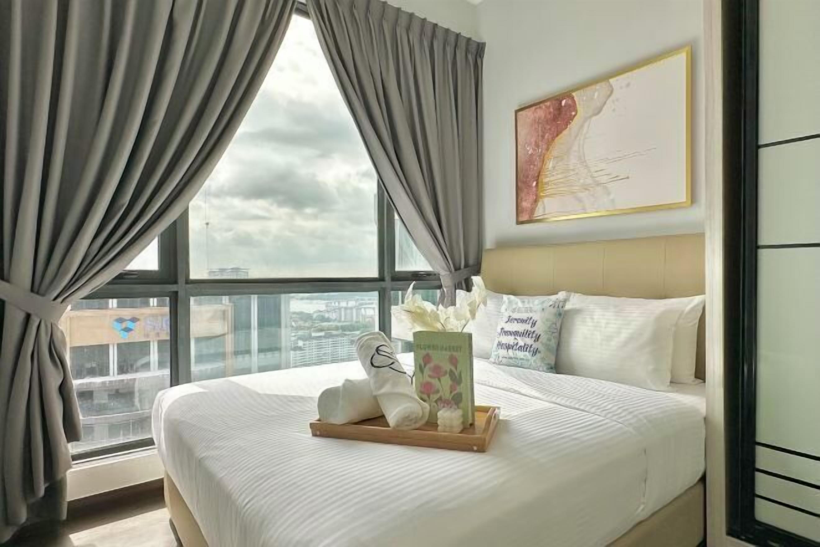 Tabla de planchar con plancha, wifi gratis y ropa de cama 