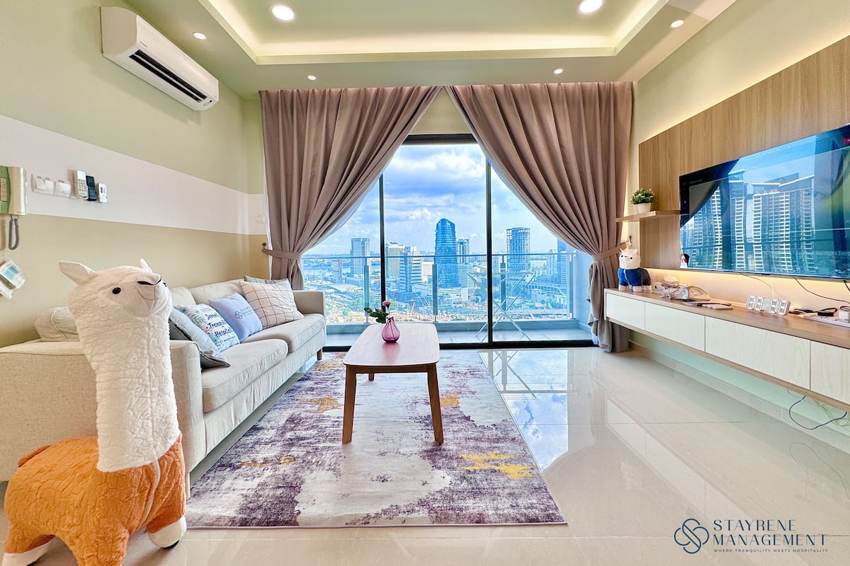 Family Apartment, 3 Bedrooms, City View | Living area | 50-inch Smart TV with cable channels, Netflix, streaming services