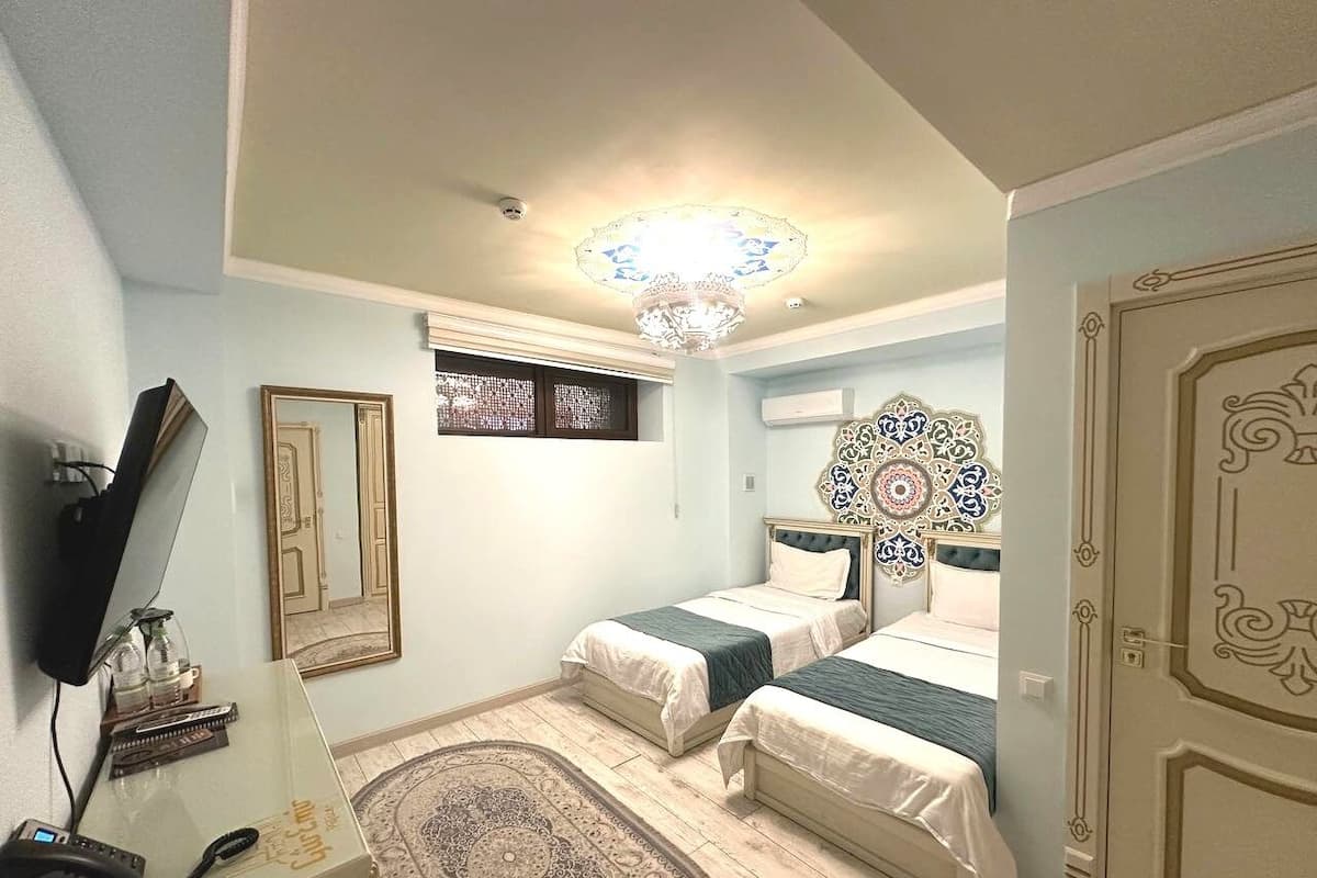 Economy Twin Room | Desk, laptop workspace, free WiFi, bed sheets