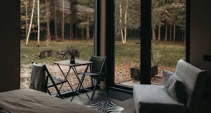 Deer Station. Dream black cabin in the woods.