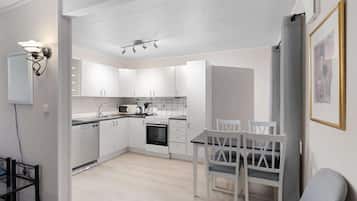 Apartment | Private kitchen | Fridge, microwave, oven, stovetop