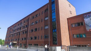 A multi-story building with a red brick facade and large windows. - HOTEL HOUSE GARGANO (San Giovanni Rotondo)