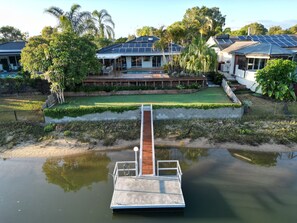 Property grounds - River front property, huge yard and pool, 2km from the beach.  (Mermaid Waters)