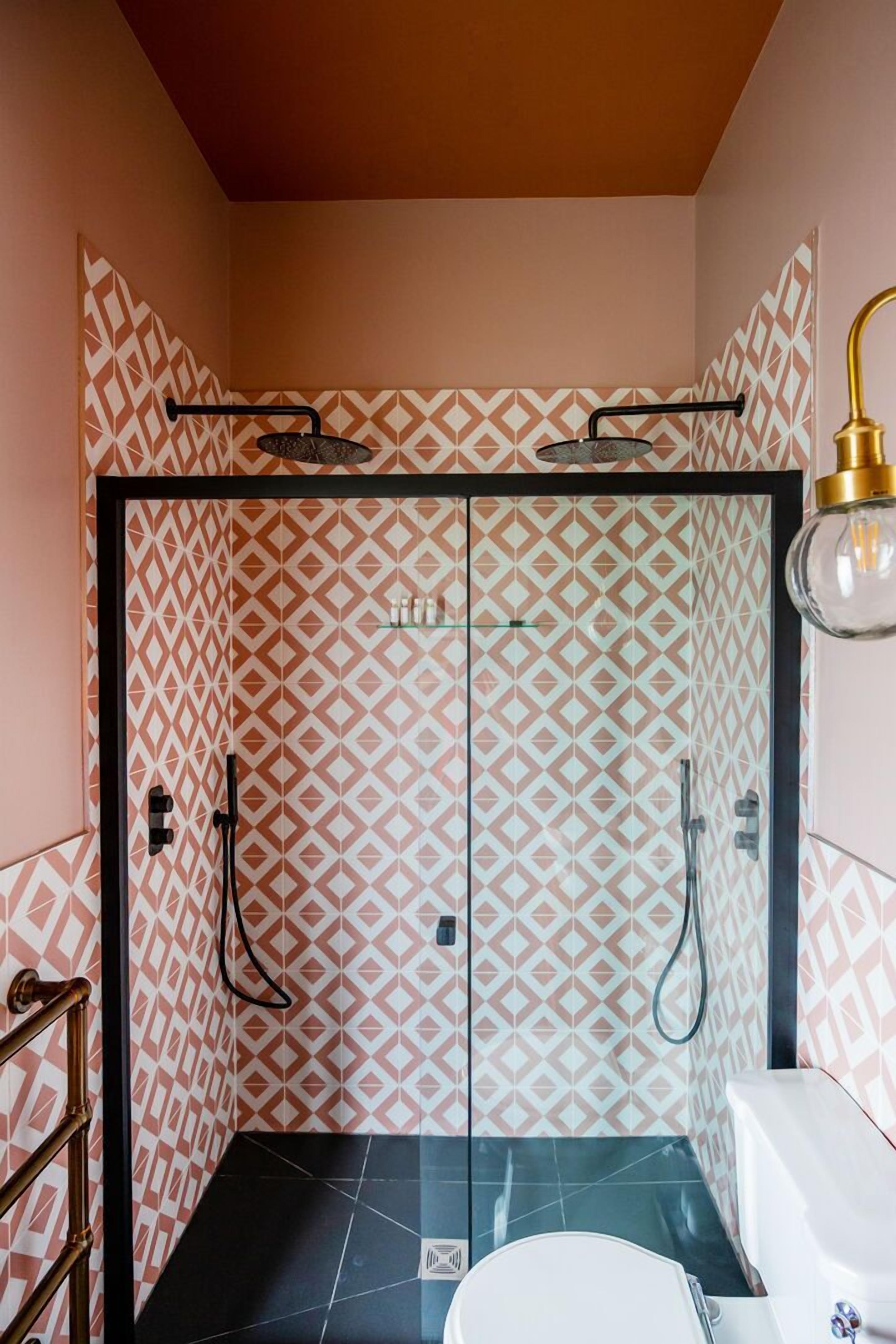 superior room | bathroom | shower, rainfall showerhead, designer toiletries, hair dryer