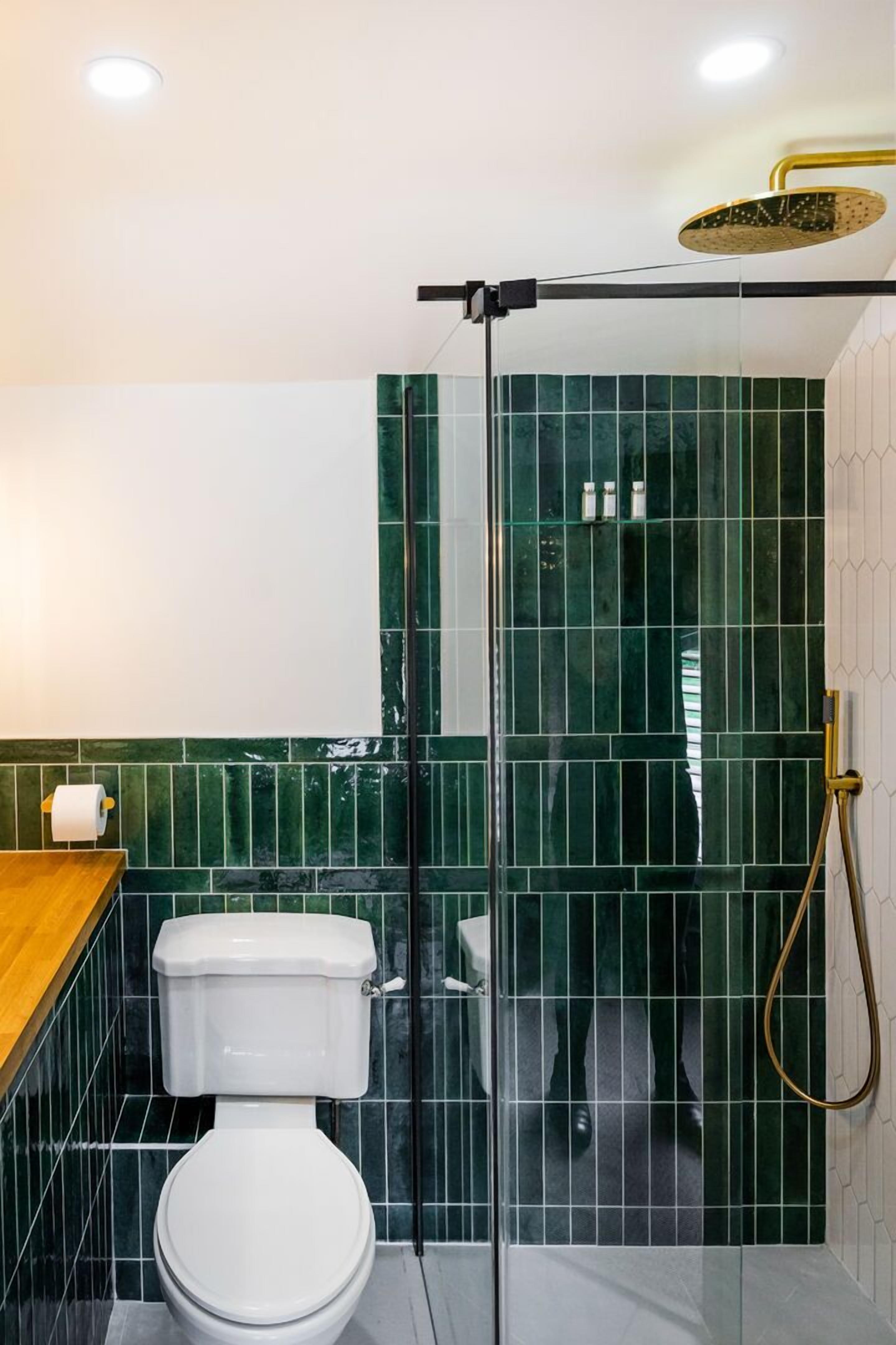 family duplex, 1 king bed with sofa bed | bathroom | shower, rainfall showerhead, designer toiletries, hair dryer