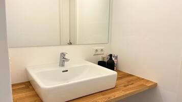 Hair dryer, towels, soap, toilet paper