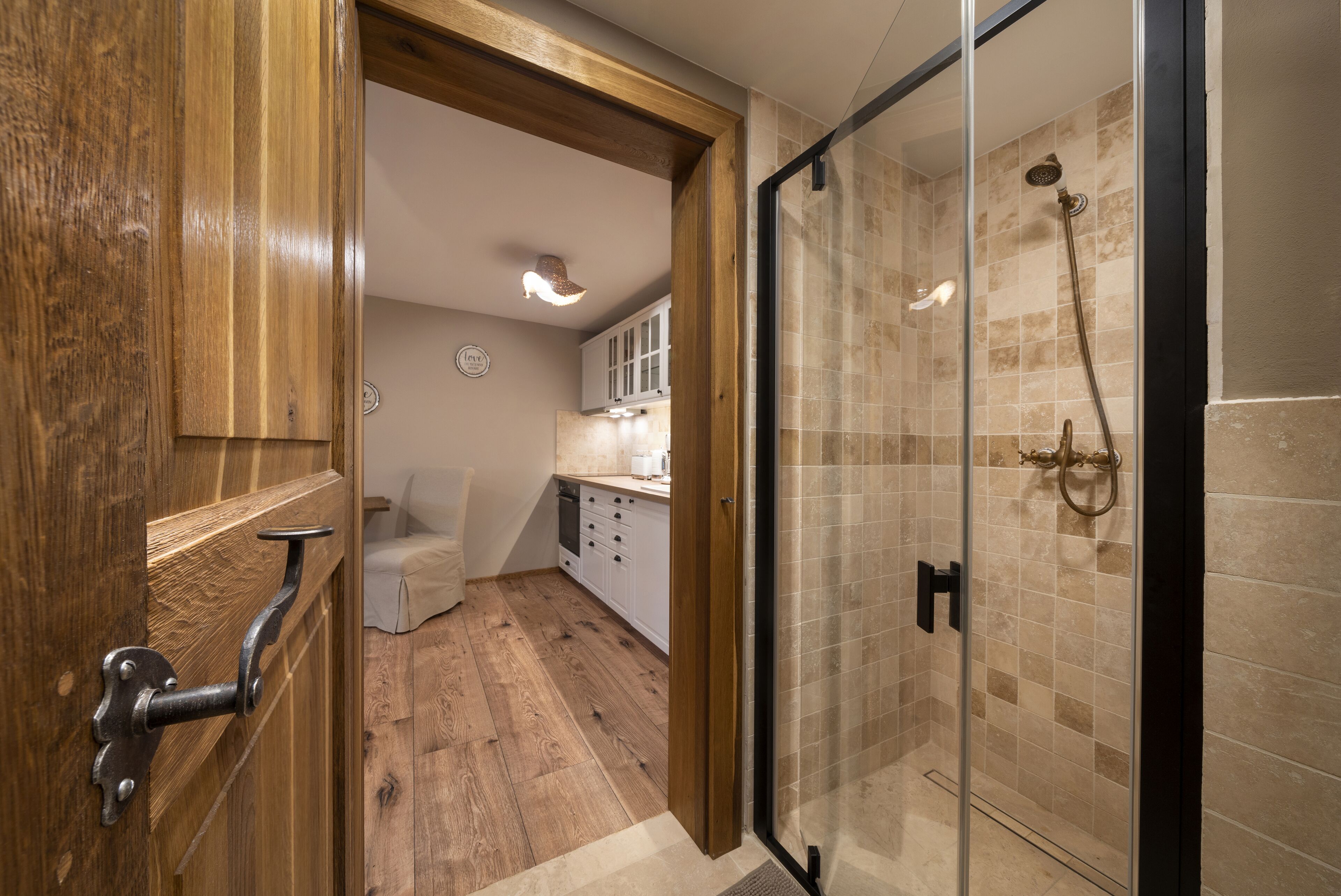 Shower, hair dryer, heated floors, towels