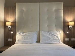 Habitació quàdruple superior | Roba de llit d'alta qualitat, cobrellits i caixa forta a l'habitació 