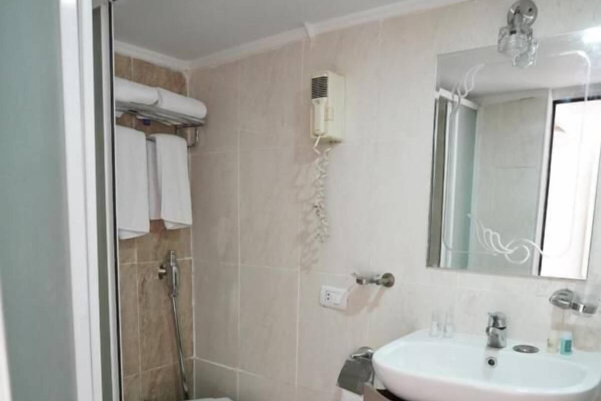 Hair dryer, bathrobes, slippers, bidet