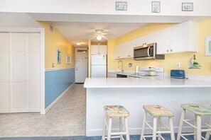 Fridge, microwave, oven, stovetop - Beautiful sunset and ocean view from 2 Bedroom Condo with Free WiFi and an Outdoor Pool Located in Midtown Only Steps to Beach! (Ocean City)