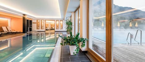 Indoor pool, outdoor pool, pool umbrellas, pool loungers