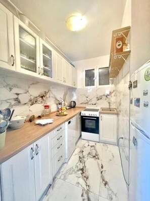 Casa conforto | Cozinha privada | Geladeira, fogão, cooktop, lava-louças