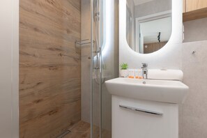 Apartment, 1 Bedroom, Balcony | Bathroom | Shower, towels, toilet paper
