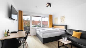 Monolocale Deluxe, 1 letto queen con divano letto | 1 camera, biancheria da letto ipoallergenica, Wi-Fi gratuito