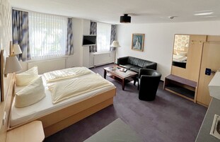 Apartment, Non Smoking, Kitchen | Desk, laptop workspace, blackout drapes, iron/ironing board