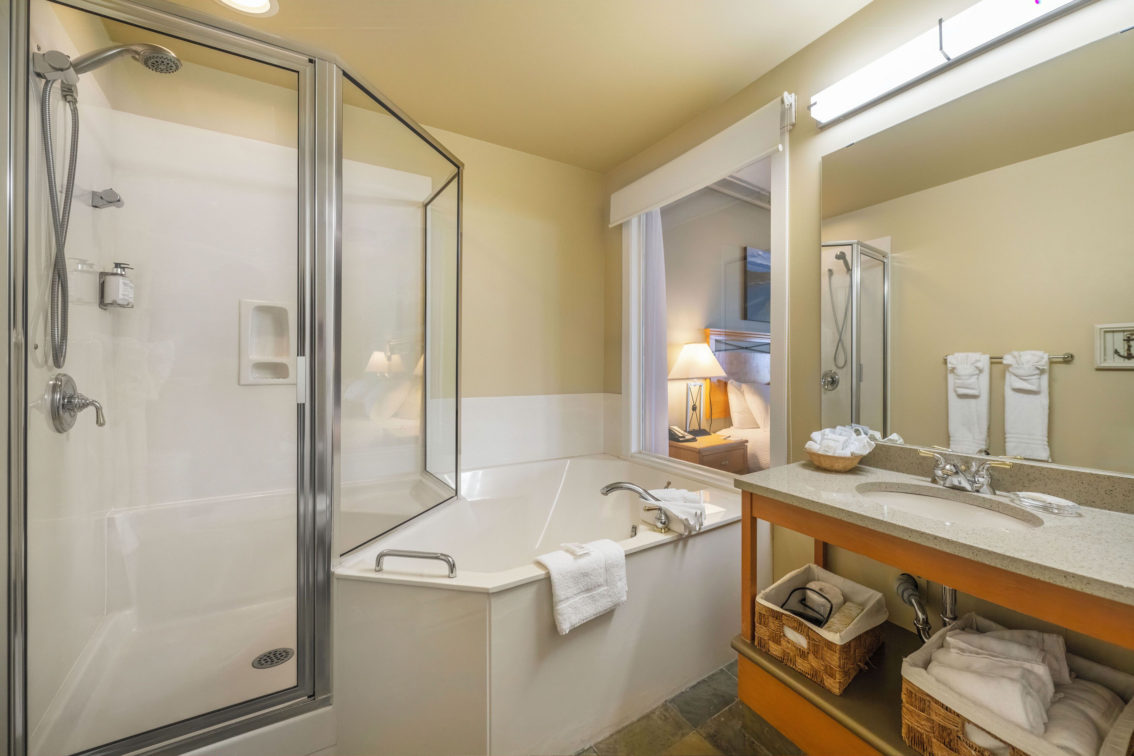 deluxe studio suite, 1 king bed with sofa bed, city view | bathroom | free toiletries, hair dryer, bathrobes, towels