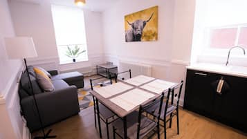 Luxury Apartment, 2 Bedrooms | Living area | 32-inch Smart TV with cable channels, Netflix, Hulu
