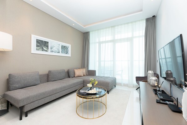 Design Apartment | Living area | 55-inch Smart TV with cable channels - Grand Luxury  - Stylish Apartment With Incredible Canal Views (Dubai)
