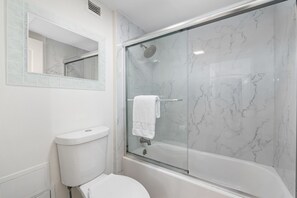 Hair dryer, towels, soap, shampoo
