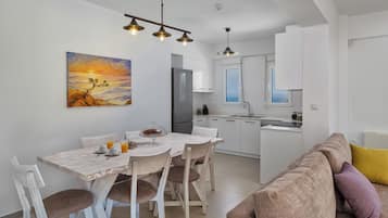 Yellow Villa | Private kitchen | Full-size fridge, microwave, oven, stovetop