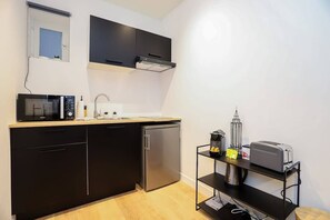 Fridge, microwave, coffee/tea maker, toaster