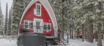 Renovated cozy cabin in sought after location with private hot tub and laundry. 