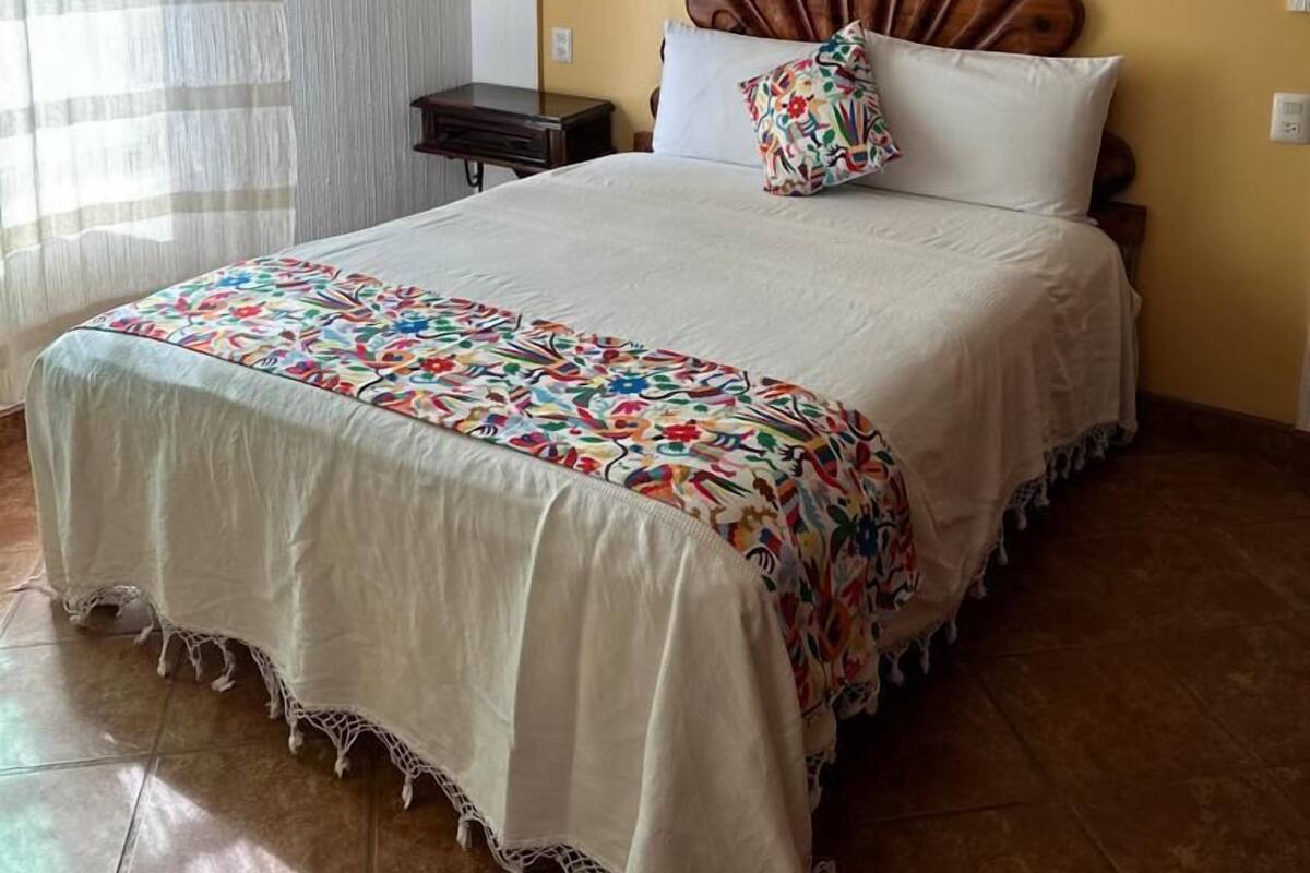 Bungalow Tradisional | Seprai antialergi, selimut bulu angsa, minibar, dan brankas