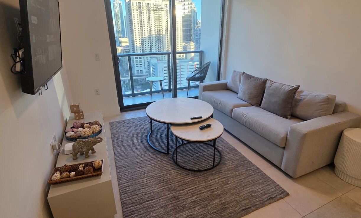 Comfort Apartment, 2 Bedrooms, City View | Living area | 50-inch Smart TV with cable channels